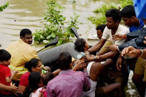 People being rescued from Kotturpuram after heavy rains in the city on December 2, 2015.