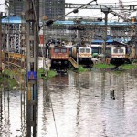 Trains stranded at a railway station as incessant rain causes flooding on tracks in Chennai on December 2, 3015.