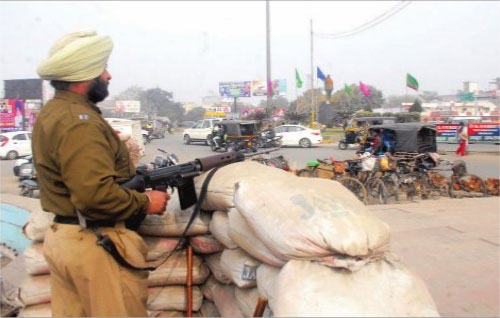A Policeman on guard on the eve of Republic Day in Amritsar