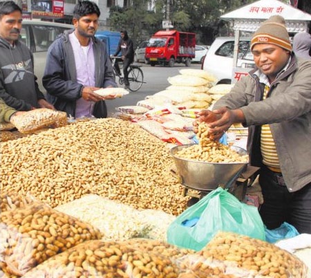 A vendor sells groundnut and jaggery items in Jalandhar