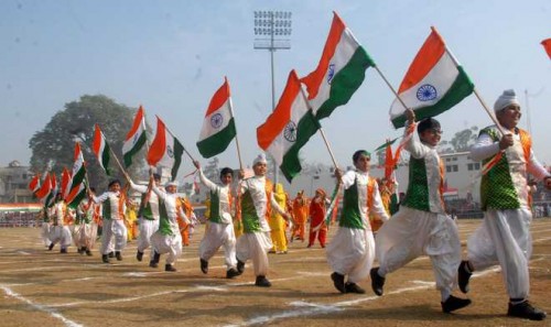Children of DAV International School display the National Flag during the Republic Day celebrations at Guru Nanak Stadium in Amritsar