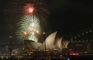 Fireworks explode over the Sydney Opera House in a 9pm display before the midnight fireworks which will usher in the New Year in Australia's largest city on December 31, 2015