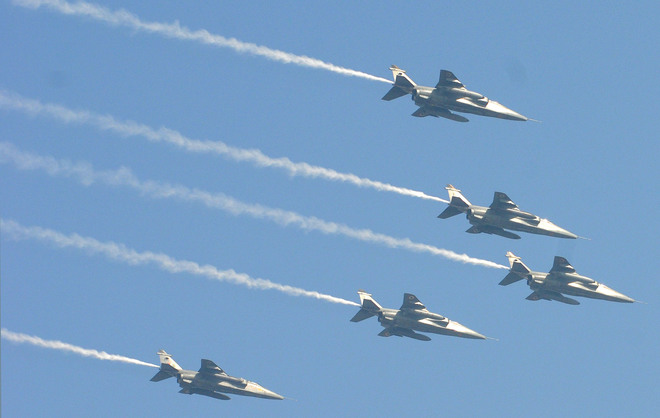 IAF's fighter planes flying past during a full dress rehearsal for the Republic Day Parade in New Delhi on January 23, 2016