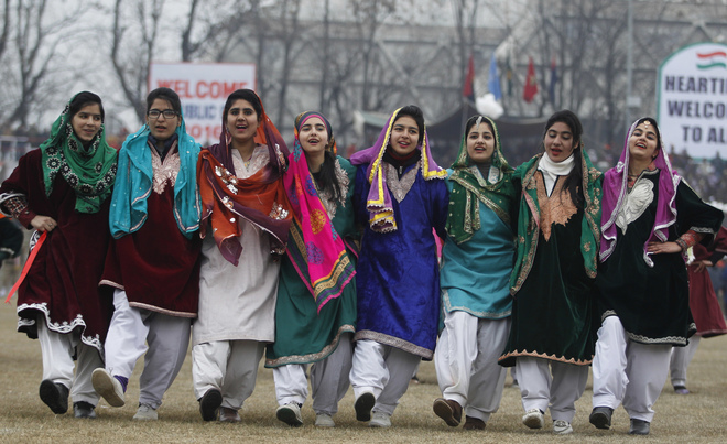 Kashmiri students dance during celebrations marking India's Republic Day