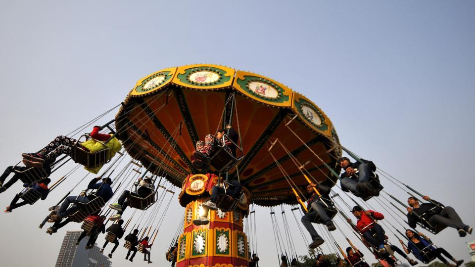 Merrymakers have fun on the first Sunday of 2017 at a mall in Noida