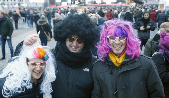 People attend New Year celebrations at the Brandenburger Tor gate in Berlin, Germany on December 31, 2015