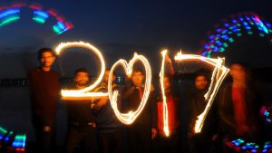 People project 2017 with lighted candles as they celebrate the New Year’s Eve near Sukhna lake in Chandigarh