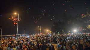 Revellers user in the new year, at JUHU chowpatty in Mumbai