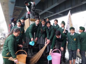 Students of DPS school wash statue of Subhash Chandra Bose to mark the Republic Day in Amritsar