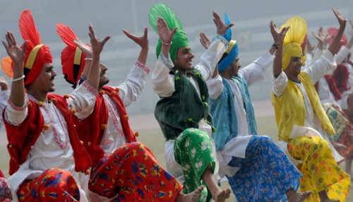 Students of different city schools perform during the 67th Republic Day celebrations at Guru Nanak Stadium in Ludhiana