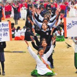 Students perform a dance during the final rehearsal for the Republic Day celebrations at Karan Stadium in Karnal