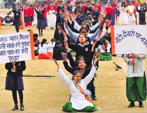 Students perform a dance during the final rehearsal for the Republic Day celebrations at Karan Stadium in Karnal