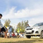A man pulls a car with his teeth on the inaugural day of Kila Raipur Rural Sports Festival at village Kila Raipur in Ludhiana