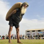 An elderly man picks heavy weight on the inaugural day of Kila Raipur Rural Sports Festival at village Kila Raipur in Ludhiana