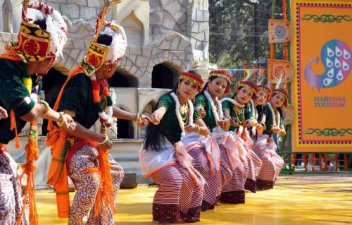 Artistes from Manipur perform during the 30th Surajkund Crafts Mela in Faridabad