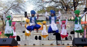 Artistes from Punjab perform at the 30th Surajkund International Crafts Mela in Faridabad