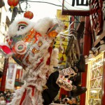 Men perform a lion dance outside a restaurant during Chinese Lunar New Year celebrations in Chinatown in Yokohama, south of Tokyo, Japan, February 8, 2016.