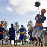 Participants performing Sikh martial arts (Gatka) on the inaugural day of Kila Raipur Rural Sports Festival at village Kila Raipur in Ludhiana