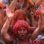 A reveller takes part take part in the Monsoon Holi Madrid festival in Madrid, Spain, on August 13, 2016.