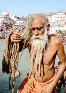 Haridwar: A sadhu takes holy dip in river Ganga on the occasion of Maha Shivaratri in Haridwar