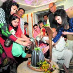 Devotees perform a ritual at a temple in Sector 23 Chandigarh, on the ocassion of Maha Shivaratri