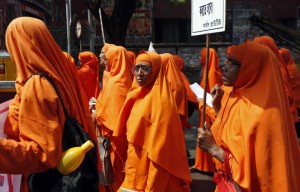 Hindu nuns march during a rally to mark the International Women's Day in Kolkata, India, March 8, 2016