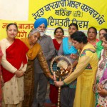 Members of the Devta Yadgari Malwa Kalaakar Manch inaugurate a function to mark International Women s Day in Bathinda