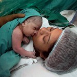 Mumbai: Mumbai's first test tube baby Harsha Chawda Shah with her new born baby boy at a hospital in Mumbai on Women's Day
