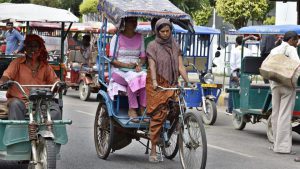 ‘Pulling along’ in a man’s world: Ranju Devi, mother of three, holds her own in a profession almost completely dominated by men. Ranju became a cycle rickshaw puller in order to supplement her family income