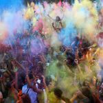 Revellers take part in the Monsoon Holi Madrid festival in Madrid, Spain, on August 13, 2016.