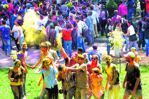 Students celebrate Holi at Panjab University in Chandigarh