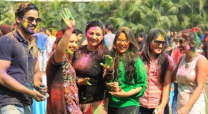 Youngsters enjoy Holi by smearing colours on each other s face in Jalandhar