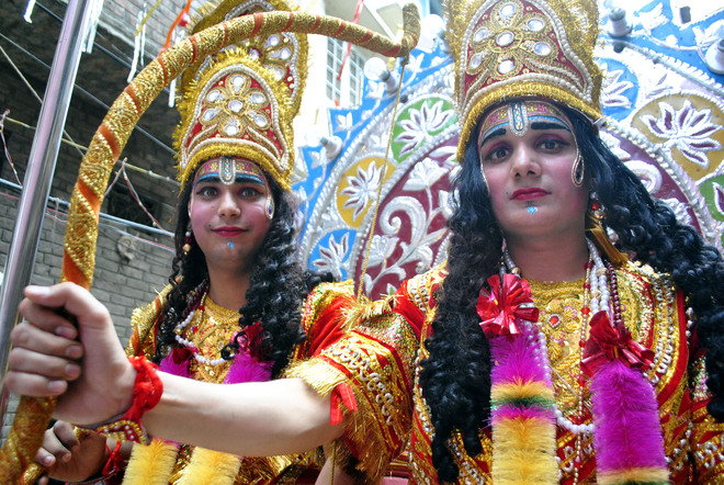 Artistes dress up as Hindu gods Rama and Lakshman at a procession to mark Ram Navami in Amritsar on April 4, 2017