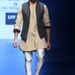Bollywood actor Sidharth Malhotra showcases a creation by designer Kunal Rawal on the fourth day of the Lakme Fashion Week (LFW) summer/resort 2016 in Mumbai on April 2, 2016