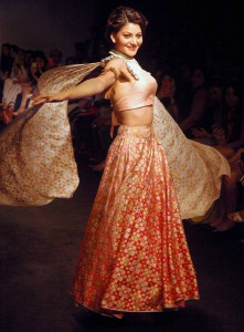 Bollywood actress Ujawala Raut display the Designer's Lalit Dalmia collection on the fourth day of the Lakme Fashion Week (LFW) summer/resort 2016 in Mumbai on April 2, 2016