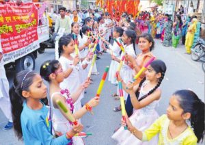 Devotees take out a religious procession to mark Ram Navmi children participate in dandia in Bathinda
