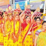Devotees take out a religious procession to mark Rama Navami women in traditinal attires in Bathinda
