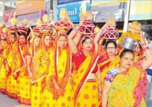 Devotees take out a religious procession to mark Rama Navami women in traditinal attires in Bathinda