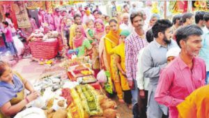 Devtees in a queue to pay obeisance at Mata Kali temple on Ashtami