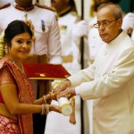 Folk singer Malini Awasthi receives the Padma Shri Award from President Pranab Mukherjee to during an investiture ceremony at Rashtrapati Bhawan in New Delhi on March 28, 2016