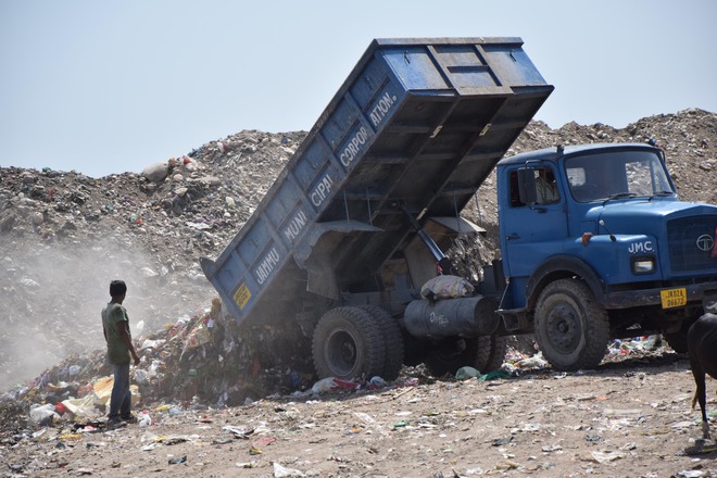 Garbage dumped near Jammu’s Bhagwati Nagar on April 22, 2016. The Jammu Municipal Corporation dumps tonnes of rubbish every day without treating them, putting some 15 lakh people in the city at risk of epidemic