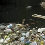 Garbage floats on the La Cangreja river in San Jose, Costa Rica, ahead of World Earth Day on April 21, 2016