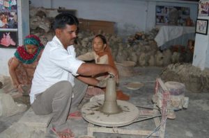 Inderpal prepares earthen items in Jhajjar