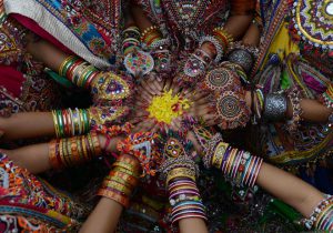 Indian folk dancers from the Panghat Group of Performing Arts pose for a photograph during a dress rehearsal for an event to mark the forthcoming Hindu festival Navaratri, or the Festival of Nine Nights, in Ahmedabad on September 25, 2016. The Navaratri festival begins on October 1, 2016.