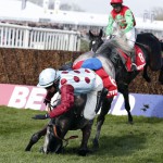 Irish Cavalier ridden by Paul Townend falls at the last during the 2.50 Betfred Bowl Steeple Chase during the Crabbie's Grand National Festival at Aintree Racecourse on April 7, 2016