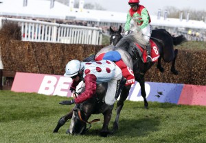 Irish Cavalier ridden by Paul Townend falls at the last during the 2.50 Betfred Bowl Steeple Chase during the Crabbie's Grand National Festival at Aintree Racecourse on April 7, 2016