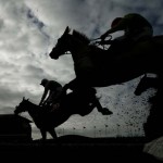 Katachenko ridden by Wayne Hutchinson on his way to winning the 4.40 Betfred Red Rum Handicap Steeple Chase during the Crabbie's Grand National Festival at Aintree Racecourse on April 7, 2016