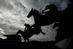 Katachenko ridden by Wayne Hutchinson on his way to winning the 4.40 Betfred Red Rum Handicap Steeple Chase during the Crabbie's Grand National Festival at Aintree Racecourse on April 7, 2016