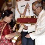 Kokilaben Ambani (left), wife of the late industrialist Dhirubhai Ambani, receives on his behalf Padma Vibhushan Award from President Pranab Mukherjee during an investiture ceremony at Rashtrapati Bhawan in New Delhi on March 28, 2016