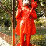 Lord Hanuman statue at roadside in Govardhan